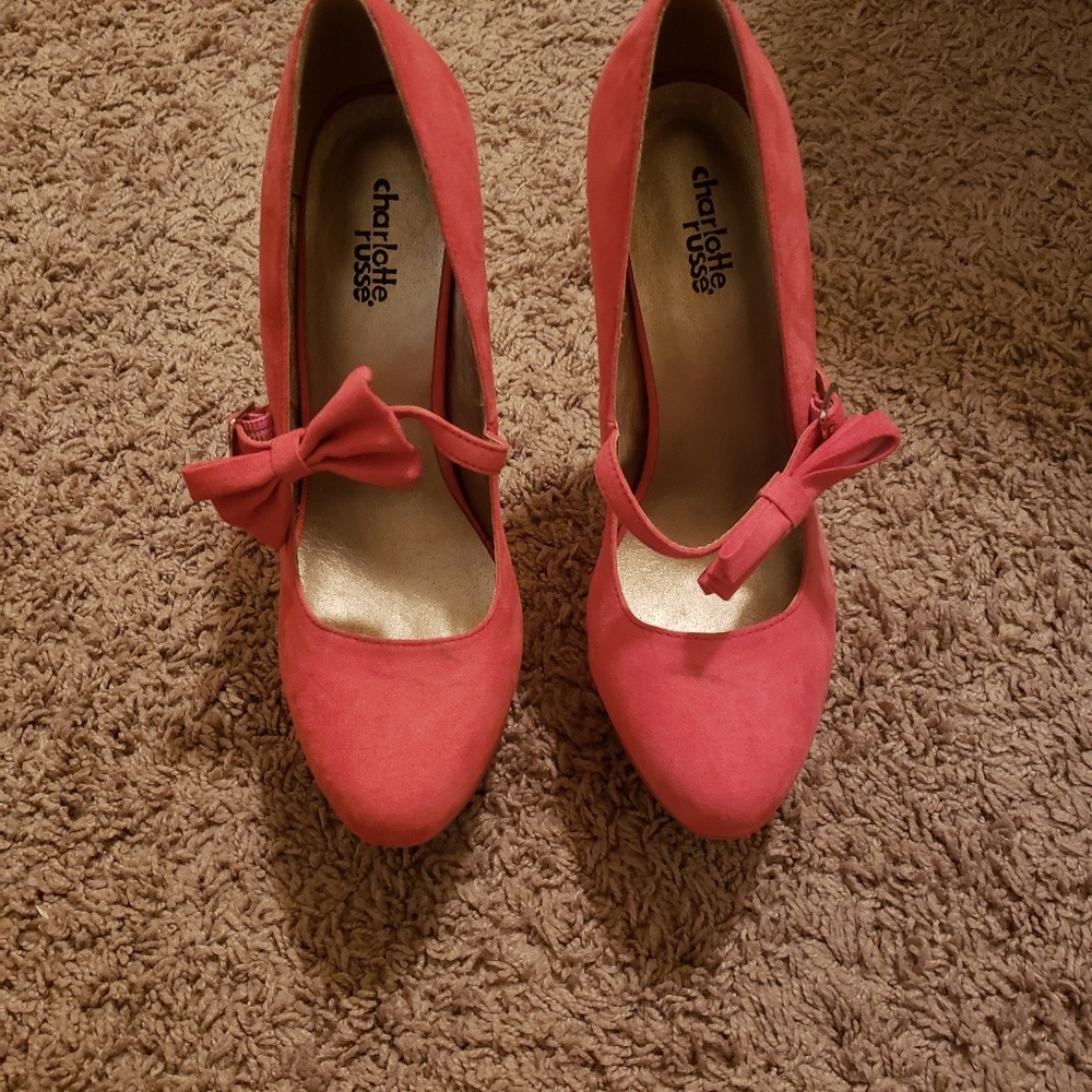 Pink high heels with bow